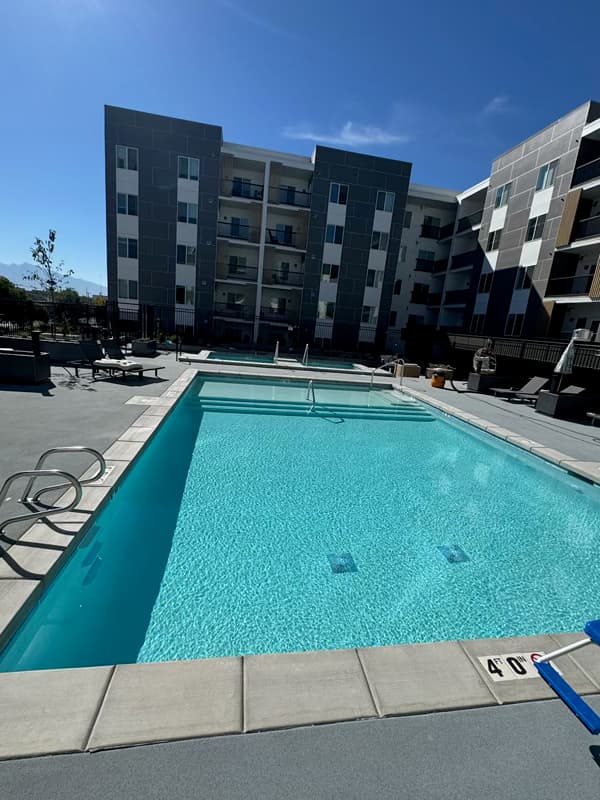 Finished swimming pool and deck at the Millcreek commercial project.